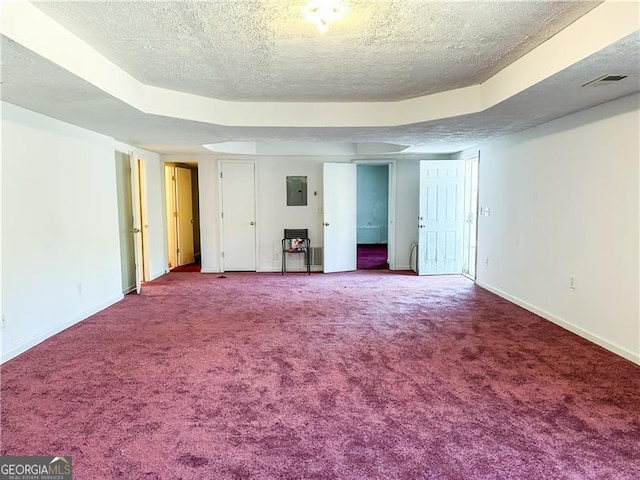 5546 Wellborn Creek Dr, Lithonia, GA 30058 - carpeted spare room with a textured ceiling, electric panel, and baseboards