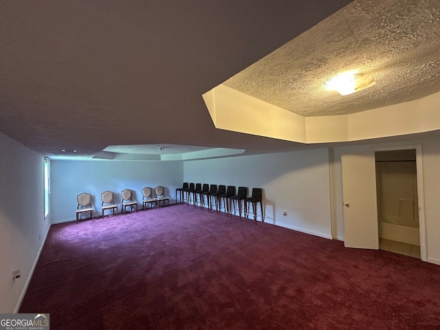 5546 Wellborn Creek Dr, Lithonia, GA 30058 - bonus room with carpet floors, a textured ceiling, and baseboards