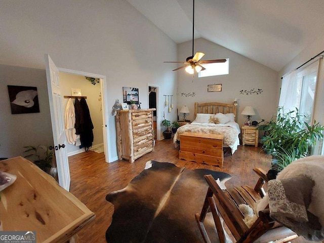 bedroom with high vaulted ceiling, baseboards, a ceiling fan, and wood finished floors