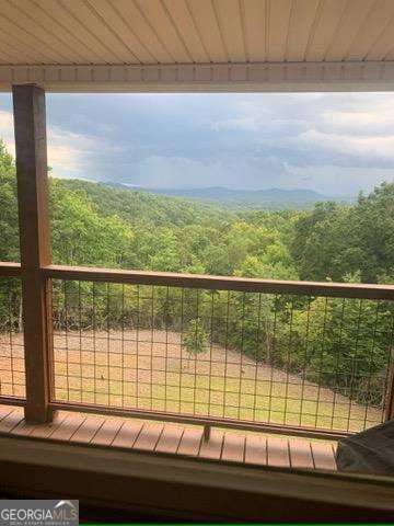 balcony with a wooded view