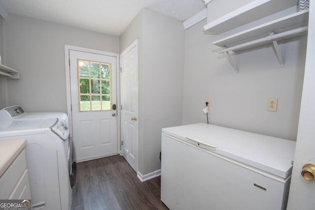 washroom with laundry area, dark wood finished floors, and washer and clothes dryer