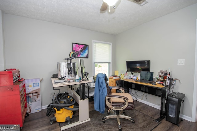 office featuring a textured ceiling, a ceiling fan, and wood finished floors