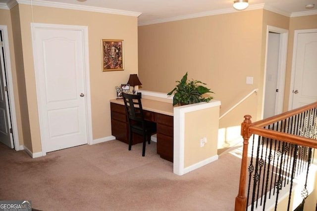 home office with baseboards, light colored carpet, and ornamental molding