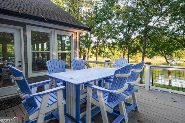 wooden deck with outdoor dining area