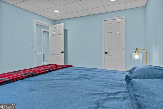 bedroom with a paneled ceiling