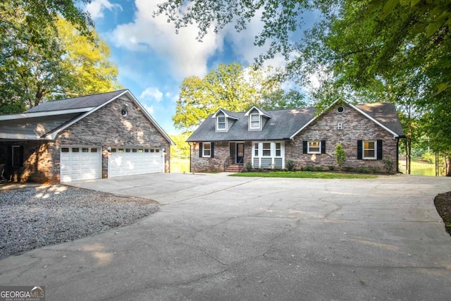 view of front facade featuring concrete driveway