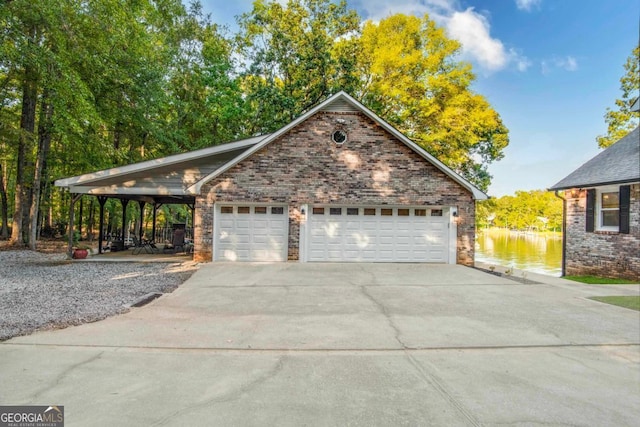 exterior space featuring concrete driveway and brick siding