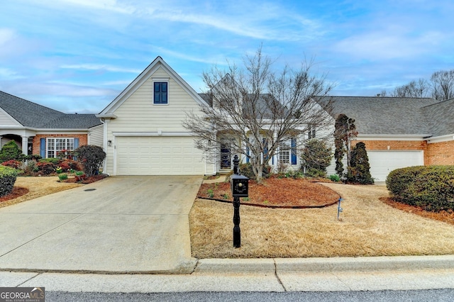 view of front of home featuring concrete driveway