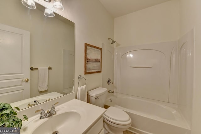 full bath featuring shower / tub combination, vanity, and toilet