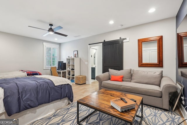 4308 Southside Dr, Acworth, GA 30101 - bedroom featuring a barn door, recessed lighting, a ceiling fan, and connected bathroom