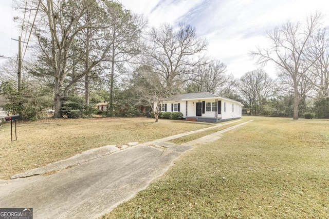 view of front of home with a front lawn