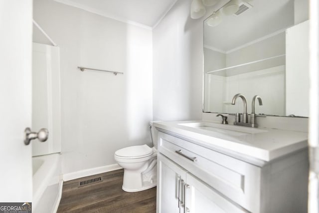 full bathroom featuring toilet, visible vents, wood finished floors, and ornamental molding