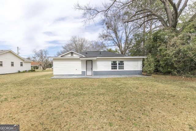 exterior space with a front lawn