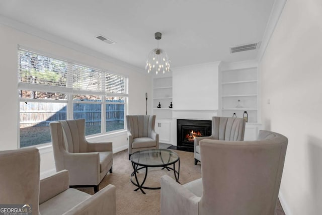 living room with a fireplace with flush hearth, visible vents, and crown molding