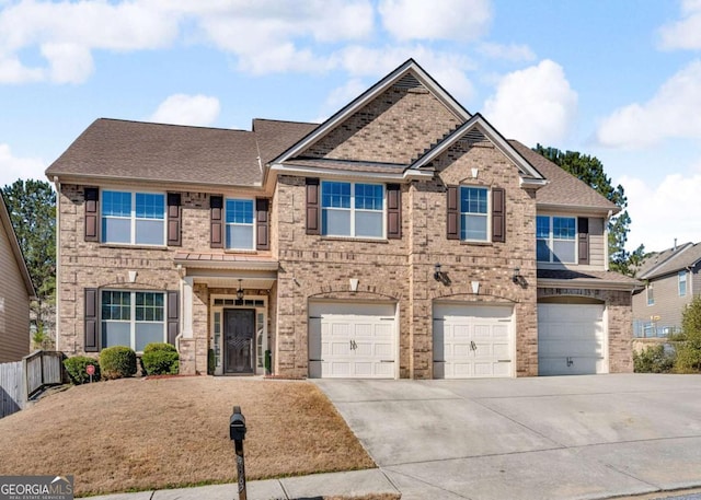 view of front facade featuring driveway, an attached garage, a shingled roof, and brick siding