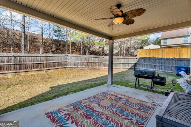 view of patio / terrace featuring a grill, a ceiling fan, and a fenced backyard