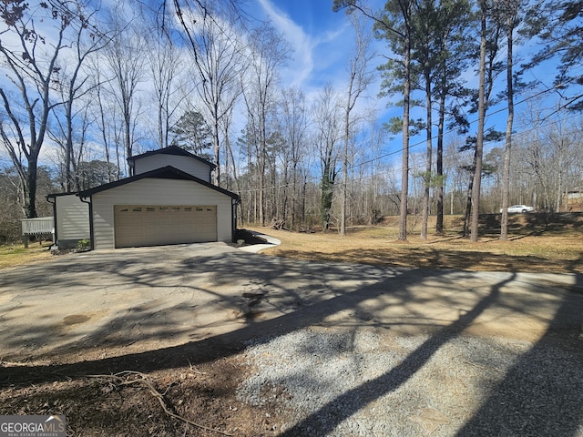 view of side of property featuring an outdoor structure