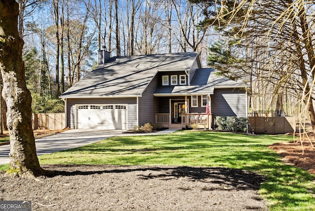 view of front facade with fence, a chimney, concrete driveway, a front lawn, and a garage