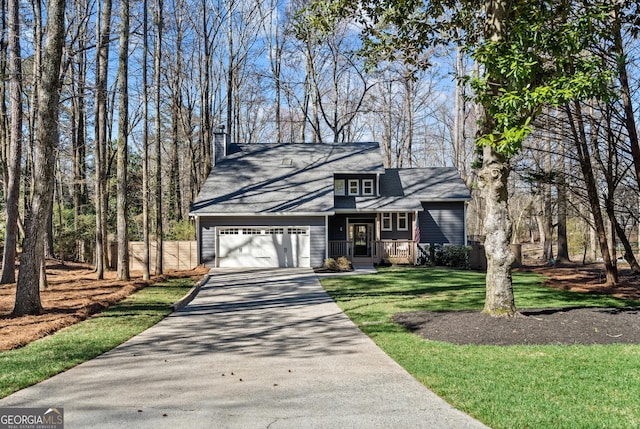 view of front facade featuring aphalt driveway, a chimney, a garage, and a front lawn