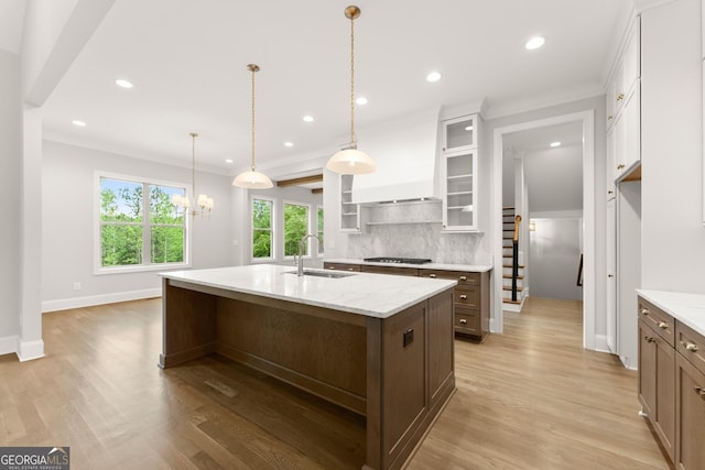 4860 Grandview Ct, Flowery Branch, GA 30542 - kitchen featuring a sink, stainless steel gas cooktop, decorative backsplash, light wood-style floors, and recessed lighting
