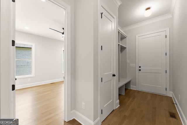 4860 Grandview Ct, Flowery Branch, GA 30542 - mudroom featuring wood finished floors, crown molding, and baseboards
