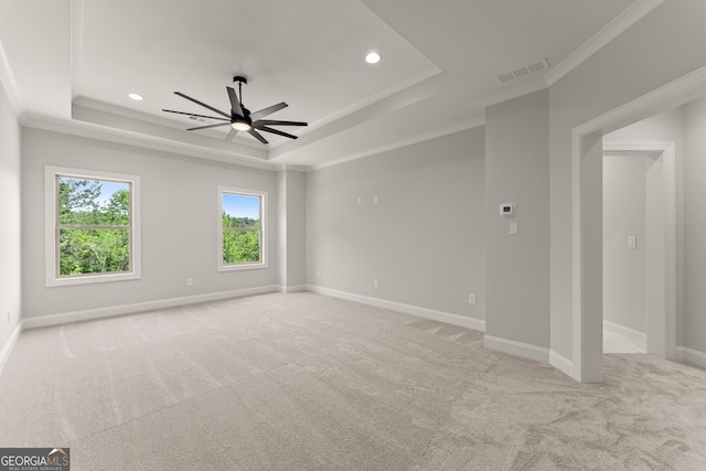 4860 Grandview Ct, Flowery Branch, GA 30542 - spare room with a raised ceiling, ceiling fan, light carpet, baseboards, and crown molding