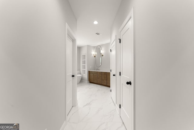 4860 Grandview Ct, Flowery Branch, GA 30542 - hall featuring light marble finish floors, recessed lighting, and baseboards