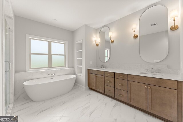 4860 Grandview Ct, Flowery Branch, GA 30542 - bathroom with marble finish flooring, double vanity, a freestanding tub, and a shower with door