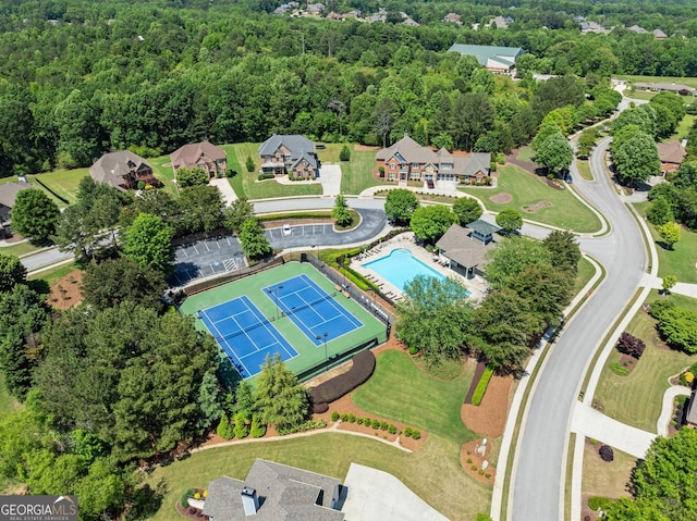 4860 Grandview Ct, Flowery Branch, GA 30542 - bird's eye view of a pool area and a heavily wooded area