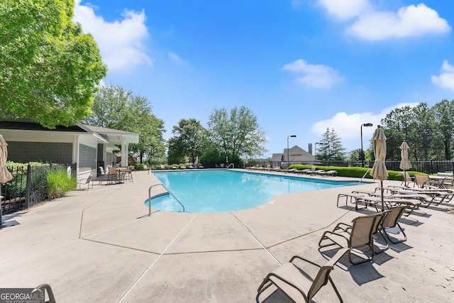 4860 Grandview Ct, Flowery Branch, GA 30542 - community pool with fence and a patio area