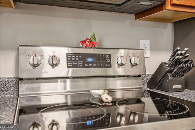 interior details with stainless steel electric range