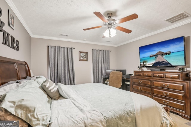 bedroom with visible vents, crown molding, and a textured ceiling