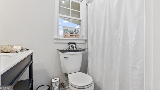 full bathroom with vanity and toilet