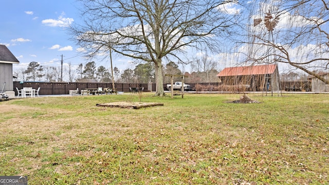 view of yard featuring fence