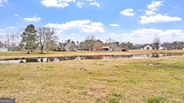 view of yard with a water view