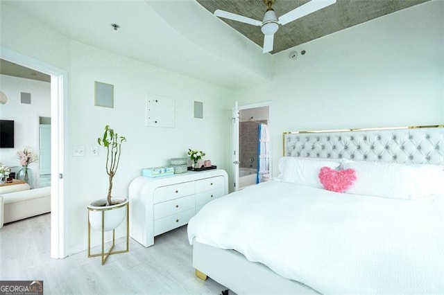 bedroom with ceiling fan and light wood-type flooring