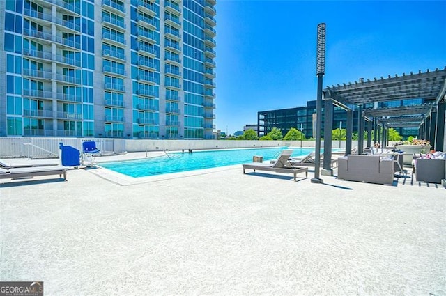 361 17th St Unit 2122, Atlanta, GA 30363 - community pool featuring a pergola, a patio, and outdoor lounge area