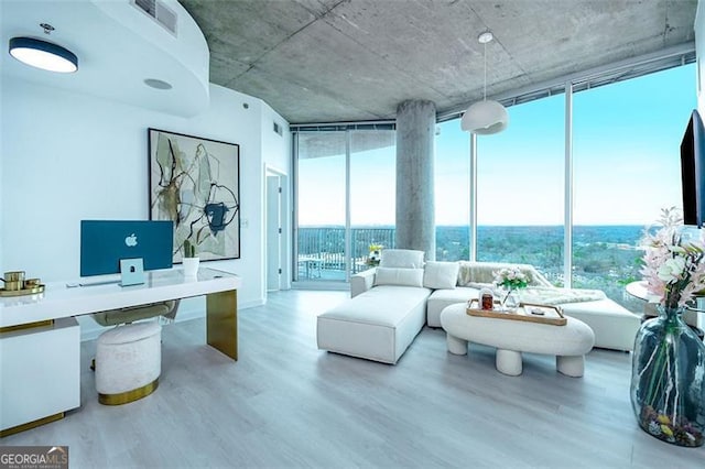 361 17th St Unit 2122, Atlanta, GA 30363 - office area featuring floor to ceiling windows and wood finished floors