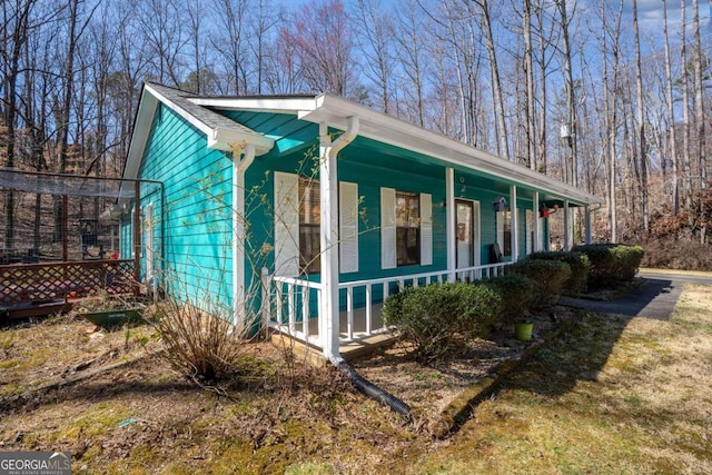 view of home's exterior with covered porch