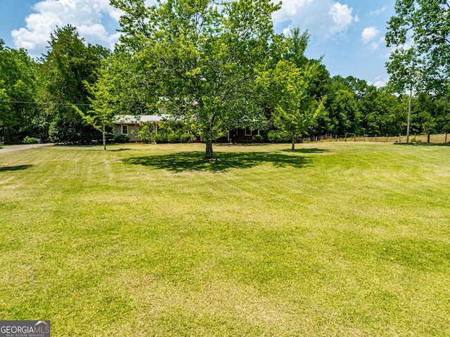 view of yard with fence