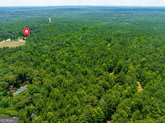 drone / aerial view with a forest view