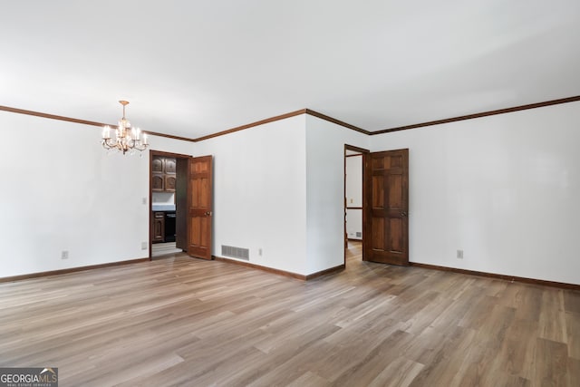 unfurnished living room featuring visible vents, ornamental molding, a chandelier, light wood-type flooring, and baseboards