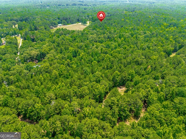 aerial view with a wooded view