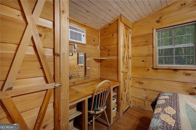 interior space featuring vaulted ceiling, wood ceiling, wood walls, and wood finished floors