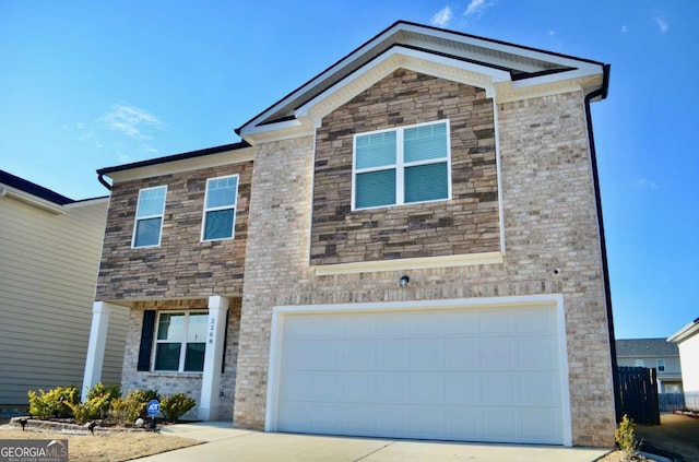 view of front of house with brick siding, driveway, and an attached garage