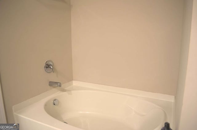 bathroom featuring a tub