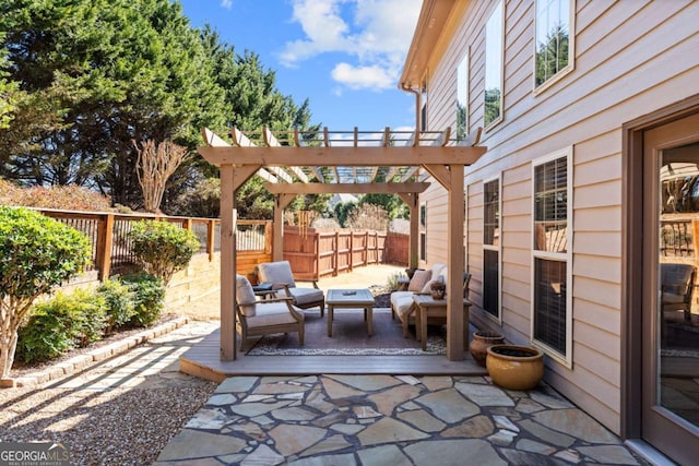 view of patio / terrace with a fenced backyard and a pergola