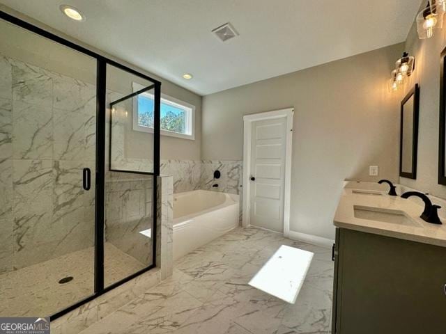 bathroom featuring a sink, visible vents, marble finish floor, a marble finish shower, and a bath