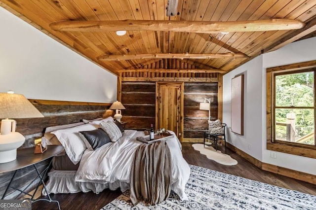 bedroom with wooden ceiling, vaulted ceiling with beams, baseboards, and wood finished floors