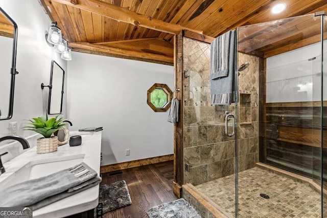 bathroom with vaulted ceiling with beams, wooden ceiling, wood finished floors, baseboards, and a stall shower